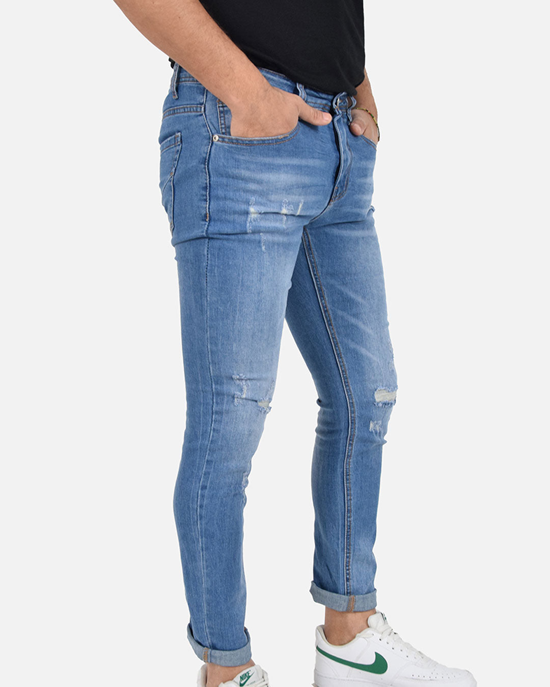 Jeans skinny con strappi