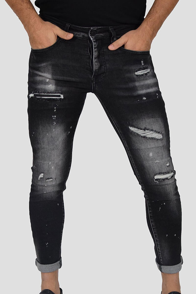 JEANS SKINNY CON STRAPPI E PITTURA