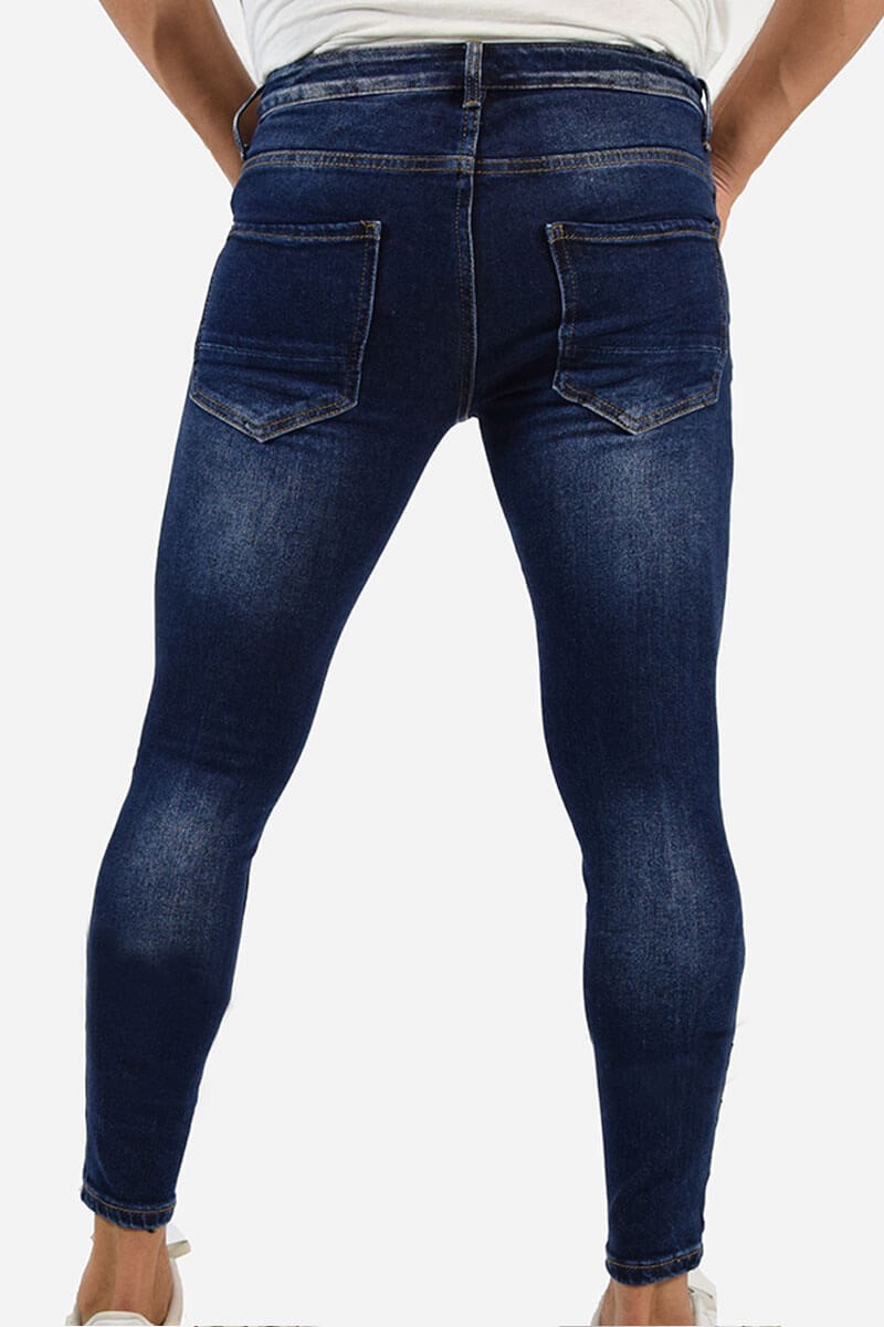 JEANS SKINNY CON STRAPPI