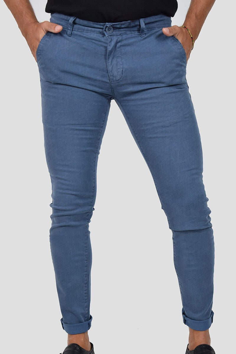 PANTALONI SKINNY CON MICROFANTASIA