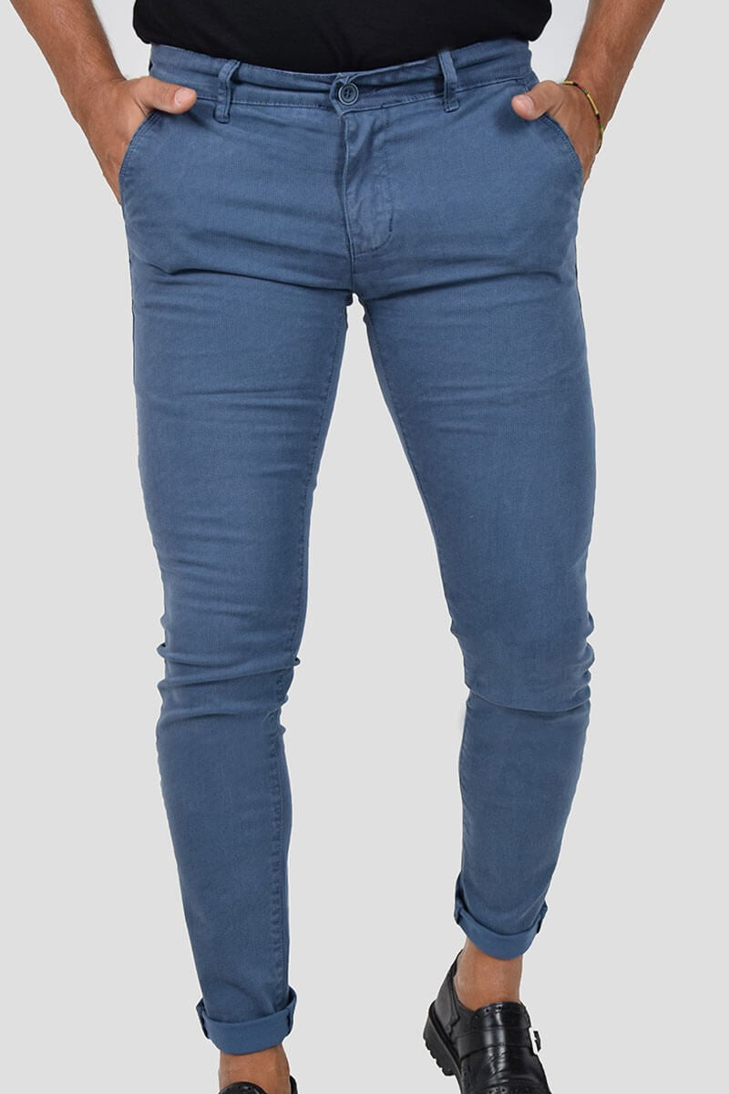 PANTALONI SKINNY CON MICROFANTASIA