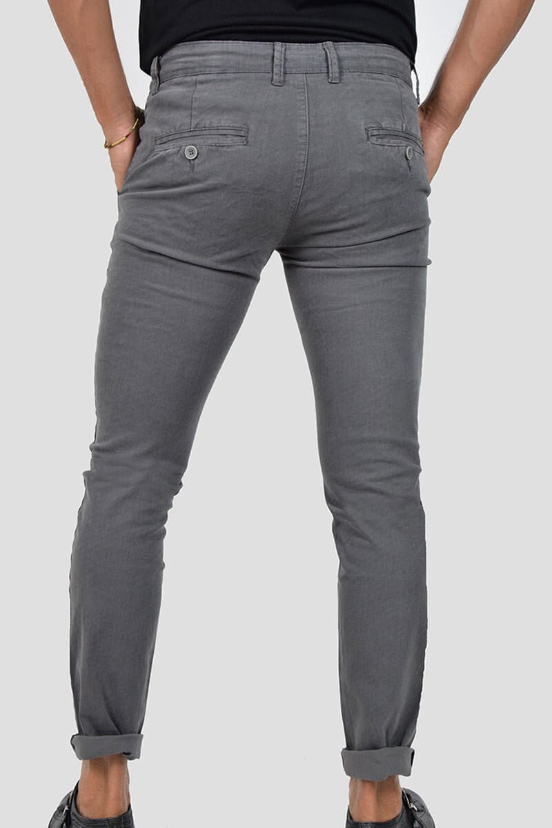 PANTALONI SKINNY CON MICROFANTASIA
