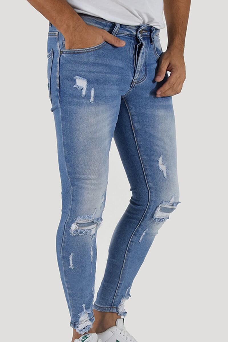 JEANS SKINNY CON STRAPPI