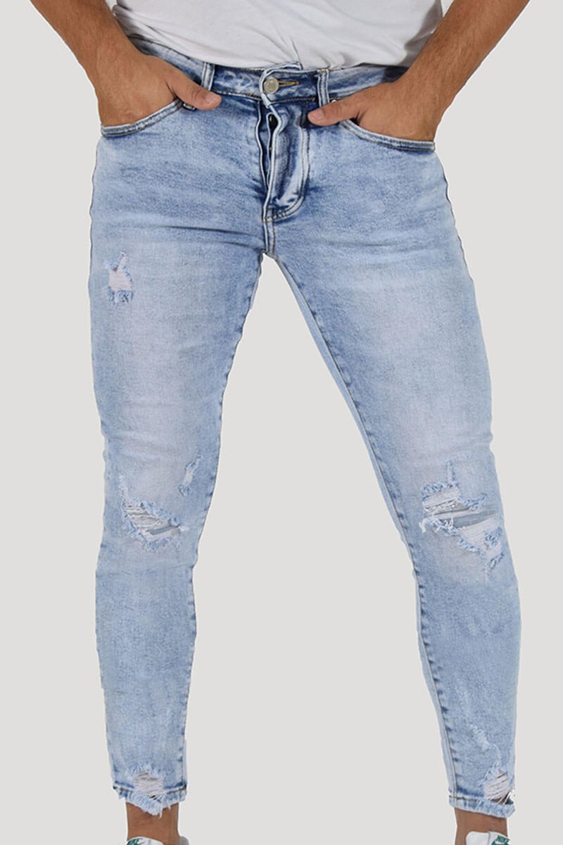 JEANS SKINNY CON STRAPPI