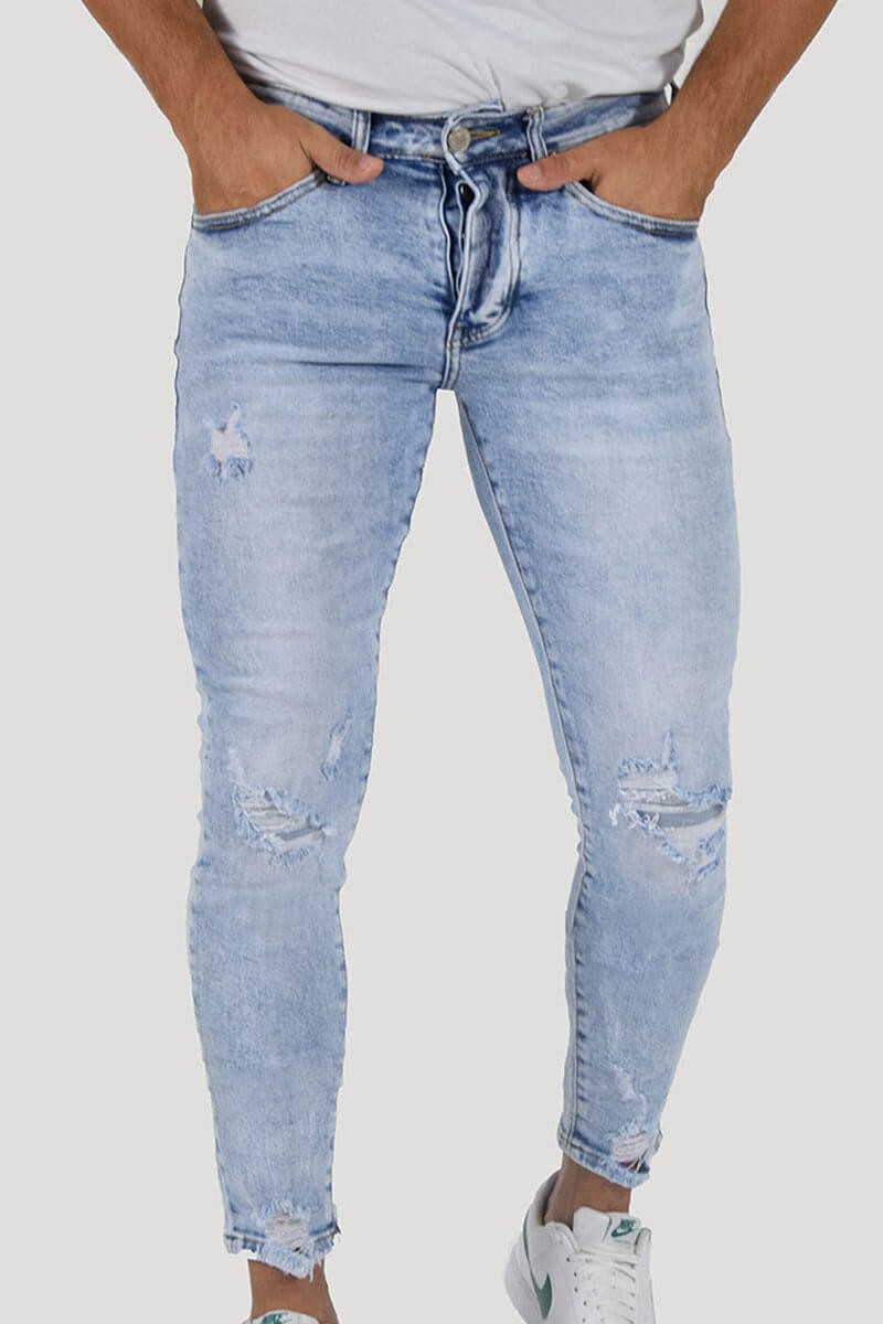 JEANS SKINNY CON STRAPPI