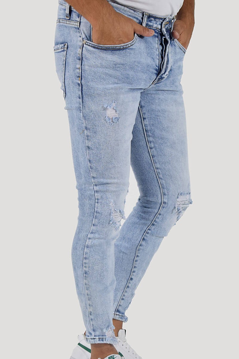 JEANS SKINNY CON STRAPPI