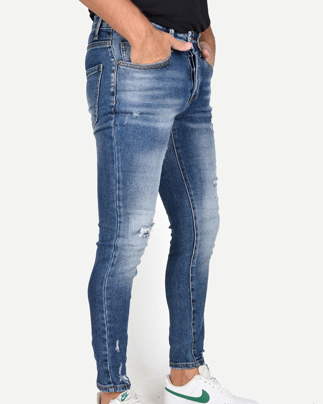 Jeans skinny con strappi