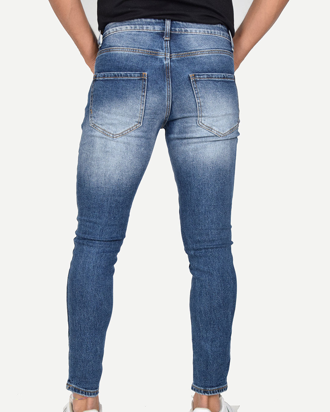 Jeans skinny con strappi