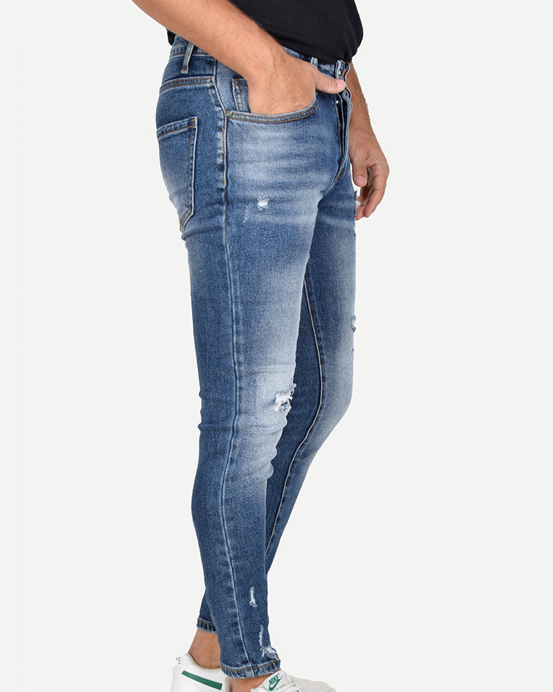 Jeans skinny con strappi