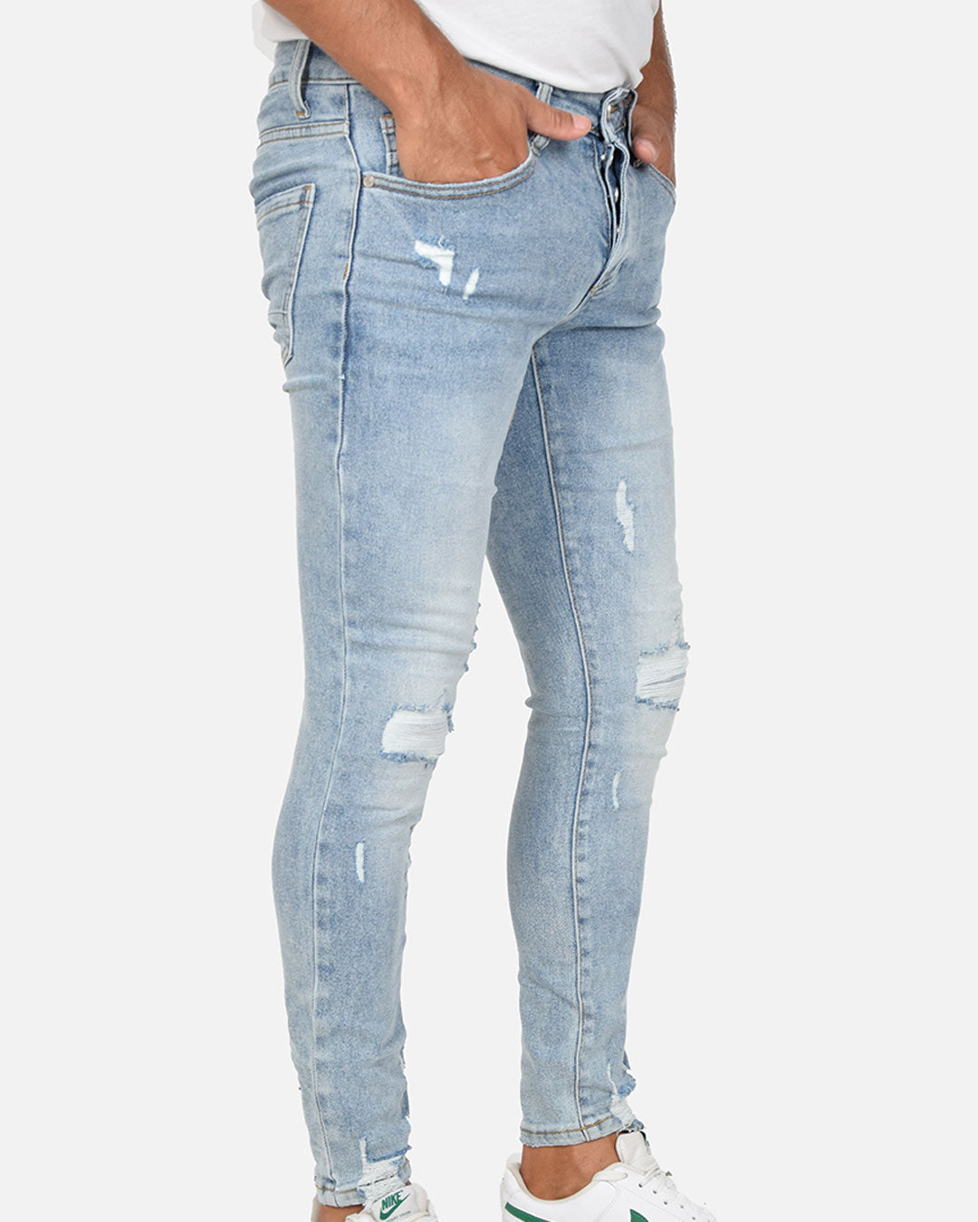 Jeans skinny con strappi