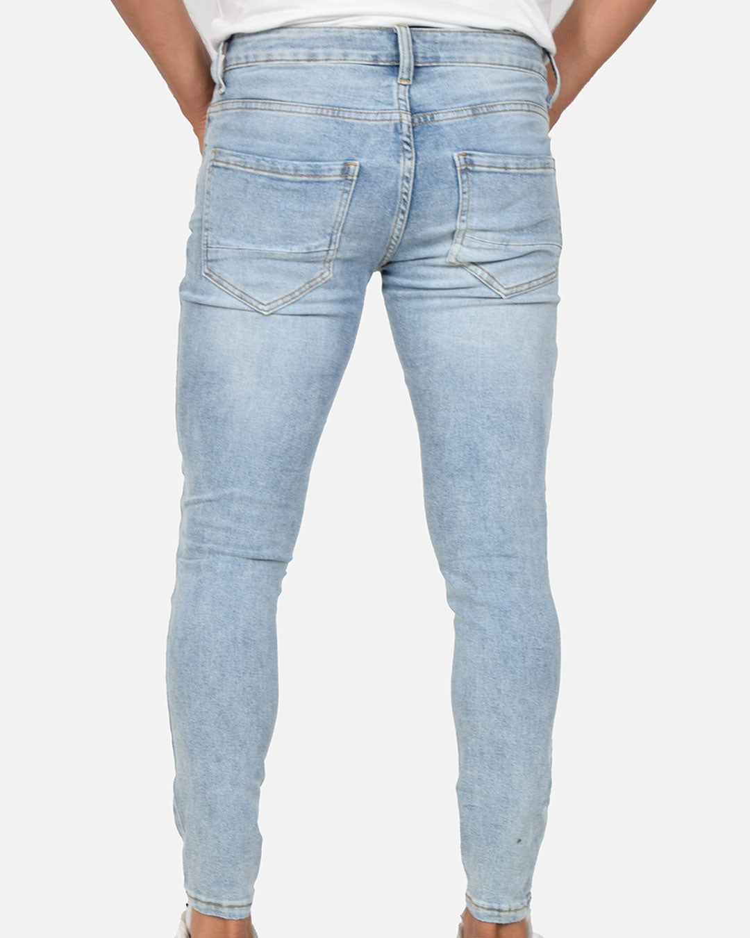 Jeans skinny con strappi