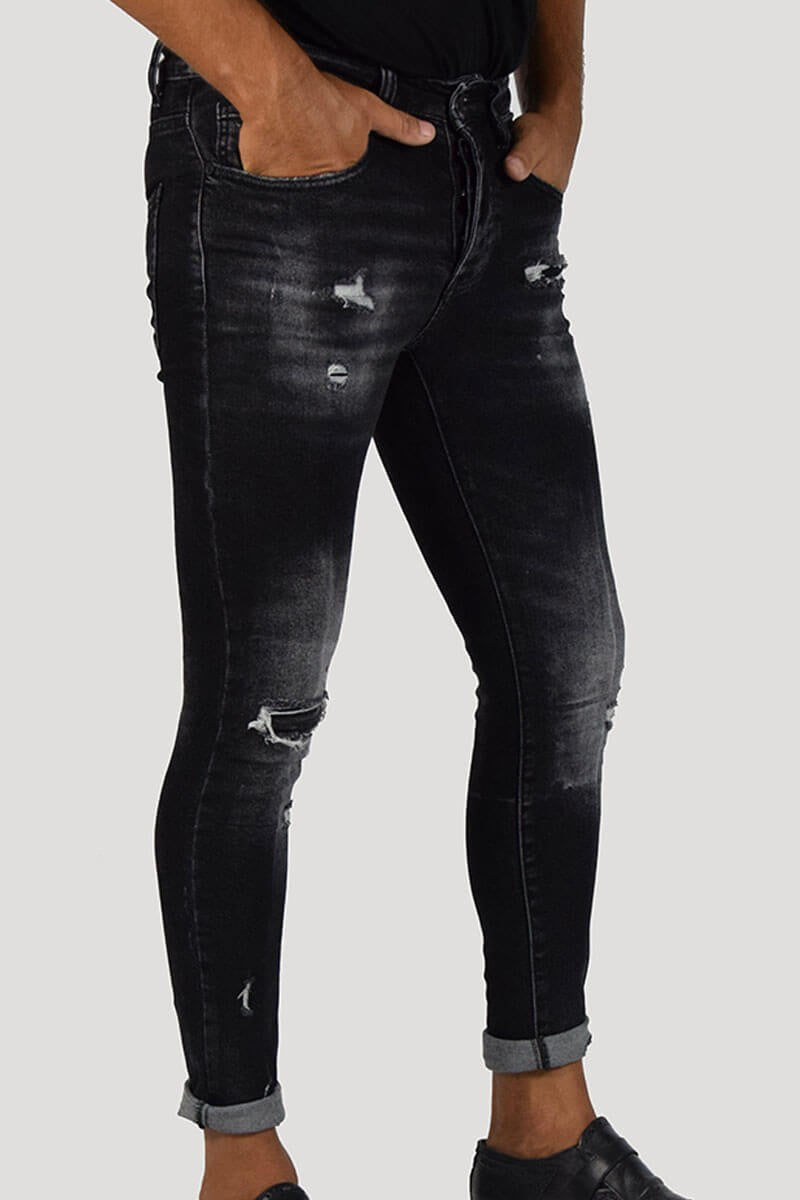 JEANS SKINNY CON STRAPPI