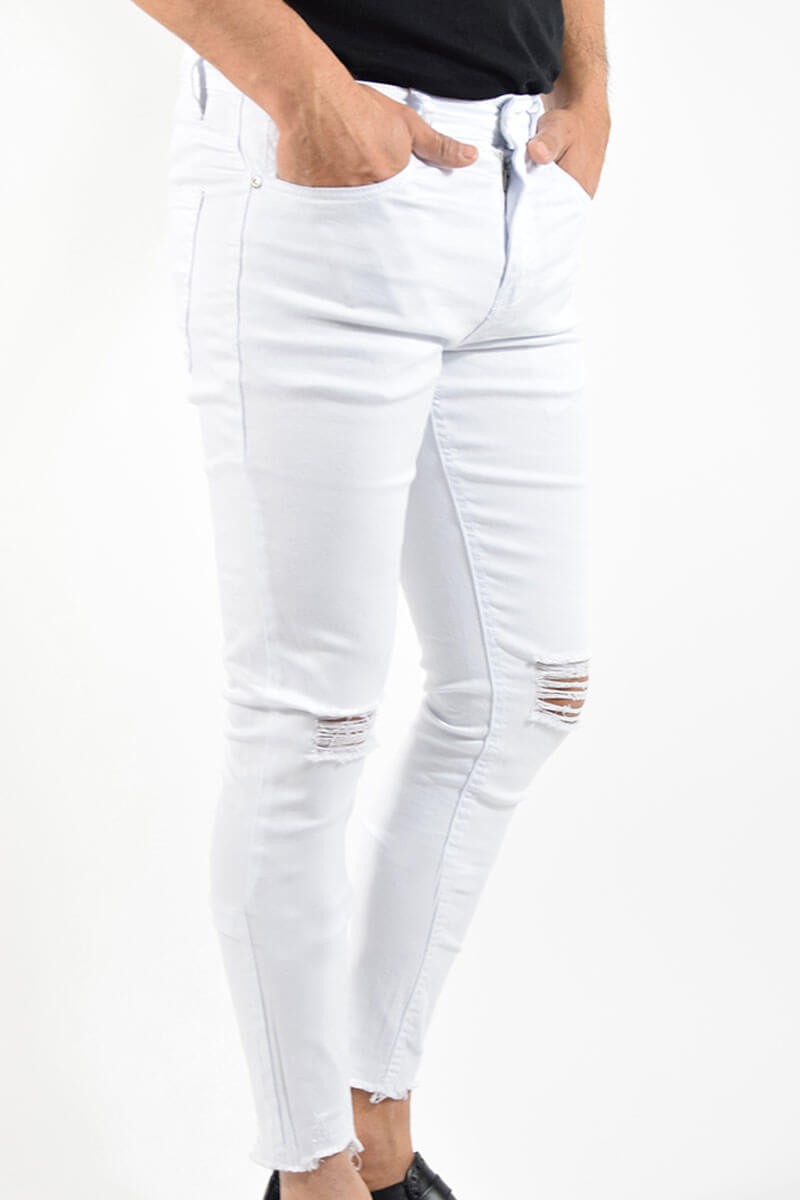 JEANS SKINNY CON STRAPPI ALLA CAVIGLIA