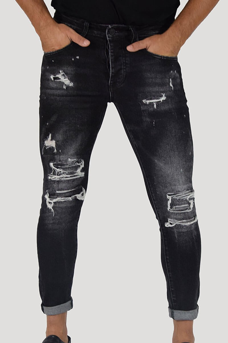 JEANS SKINNY CON STRAPPI E PITTURA