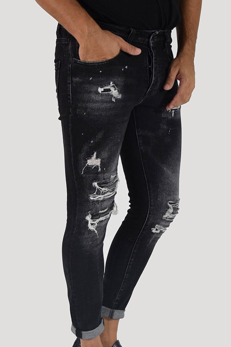 JEANS SKINNY CON STRAPPI E PITTURA