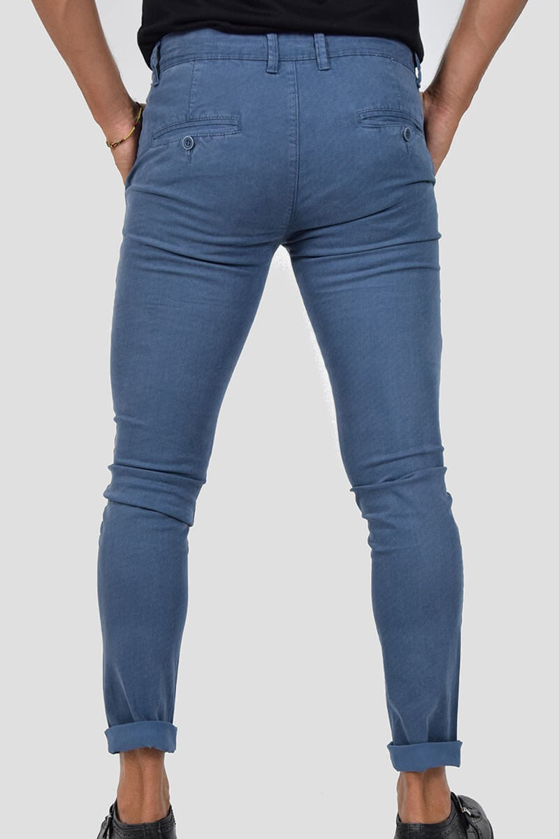 PANTALONI SKINNY CON MICROFANTASIA
