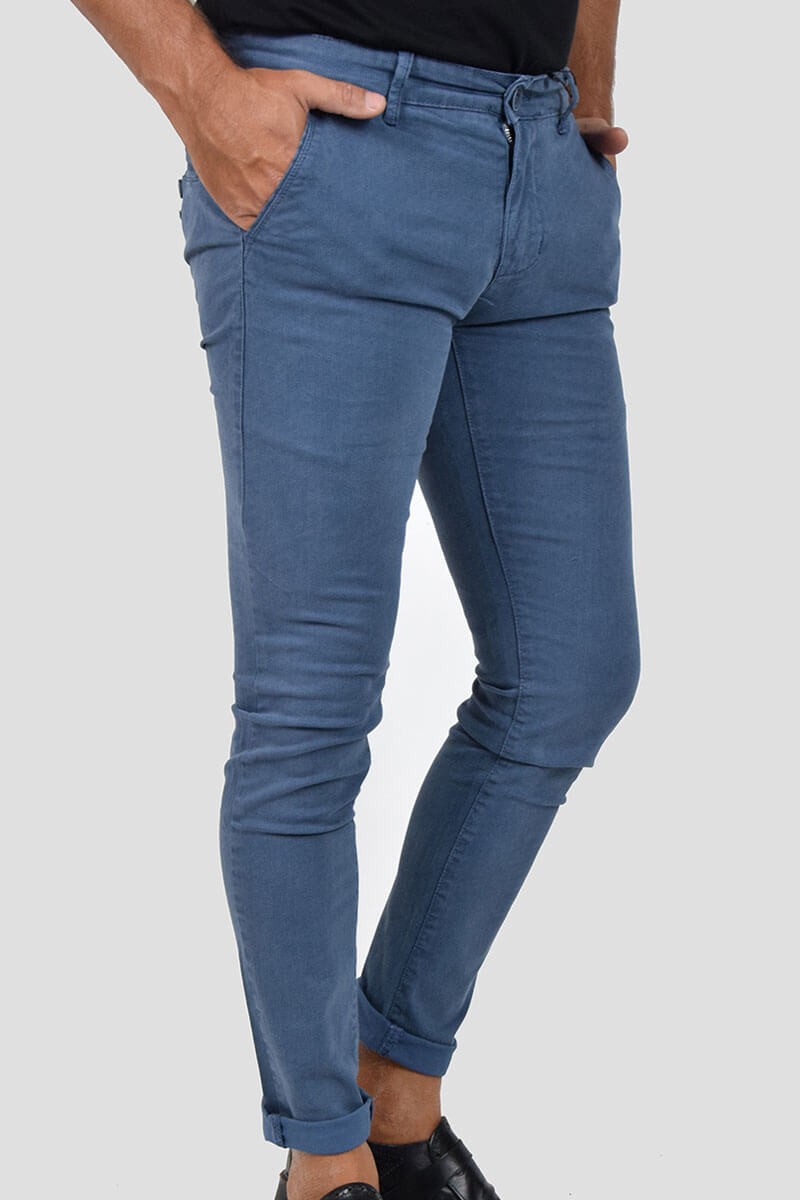 PANTALONI SKINNY CON MICROFANTASIA