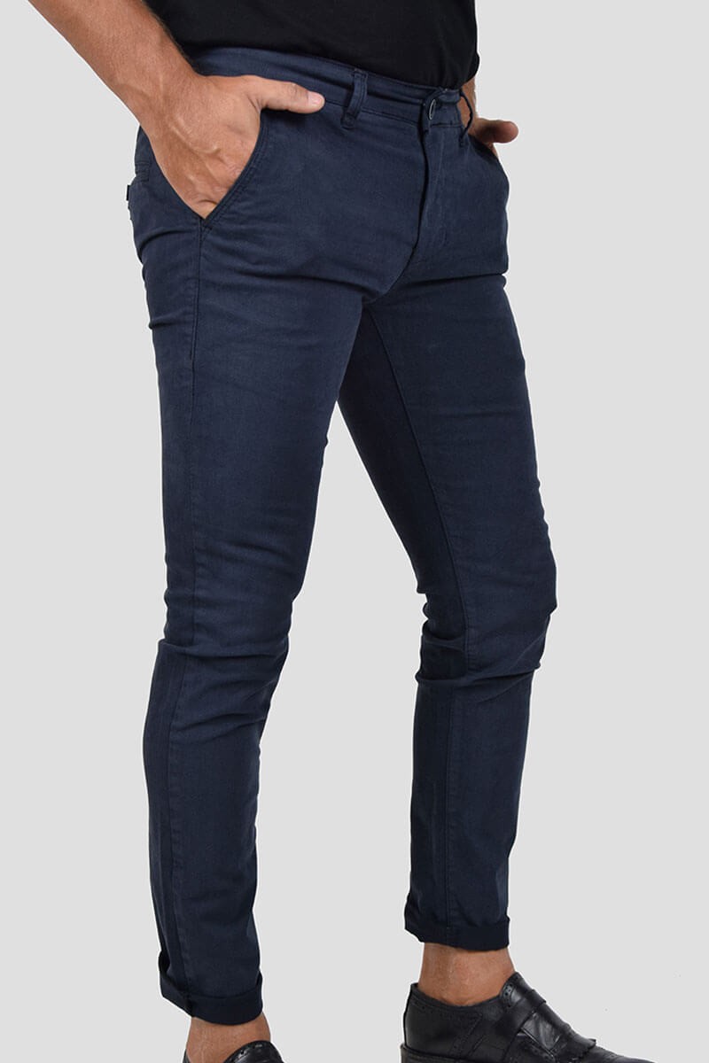 PANTALONI SKINNY CON MICROFANTASIA