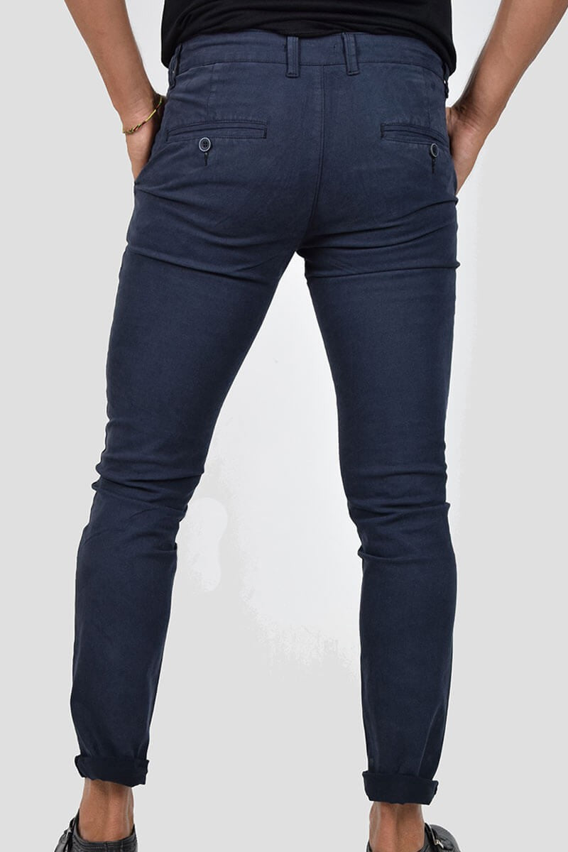 PANTALONI SKINNY CON MICROFANTASIA