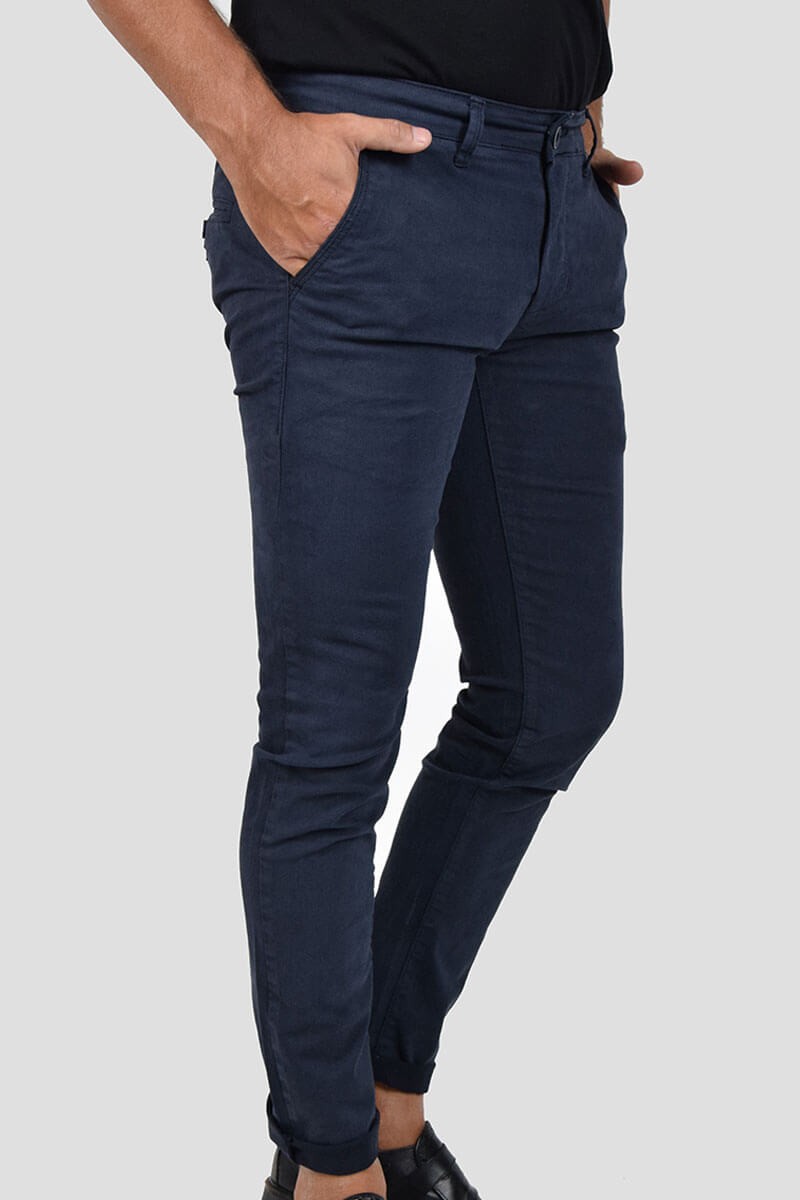 PANTALONI SKINNY CON MICROFANTASIA