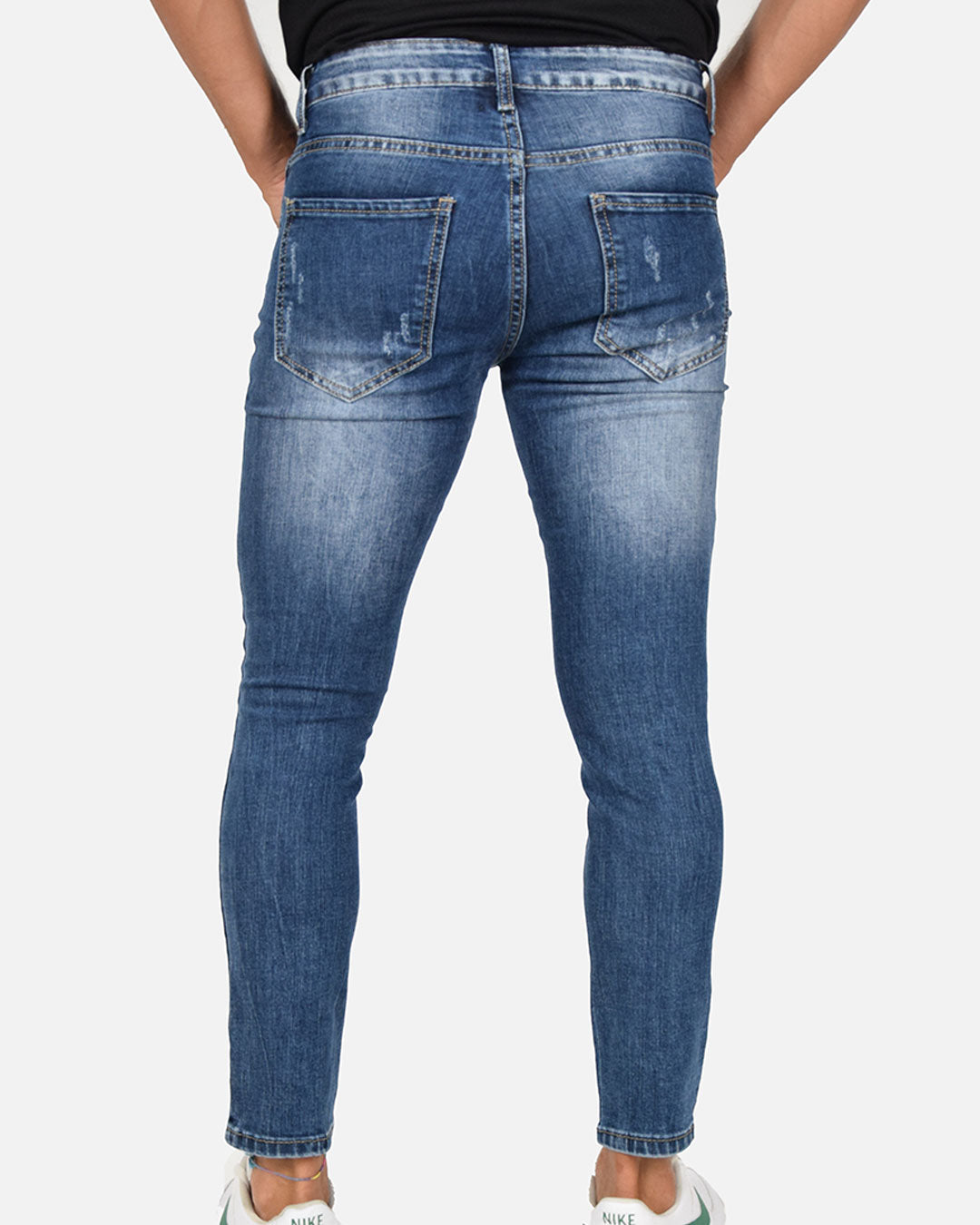Jeans skinny con strappi